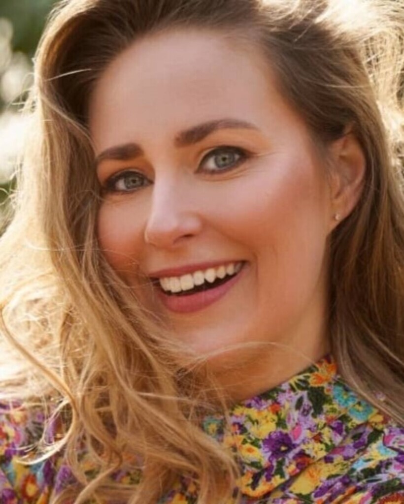 Suzanne E.