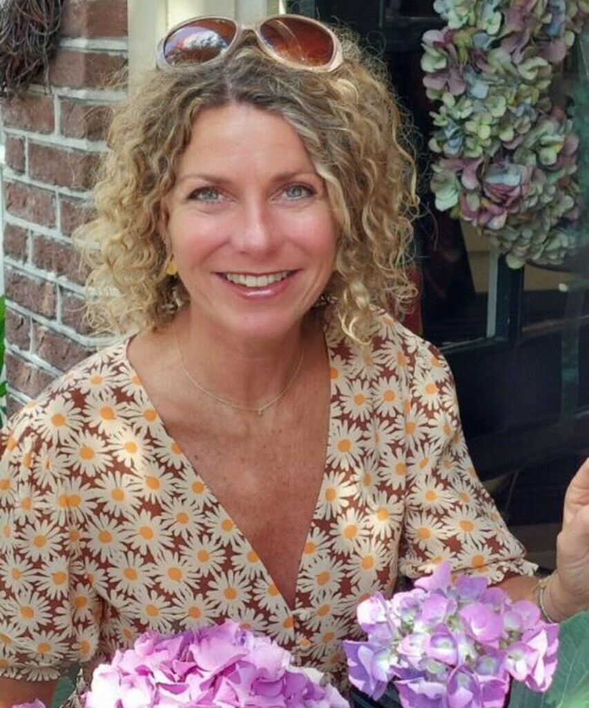 Elaine K.
