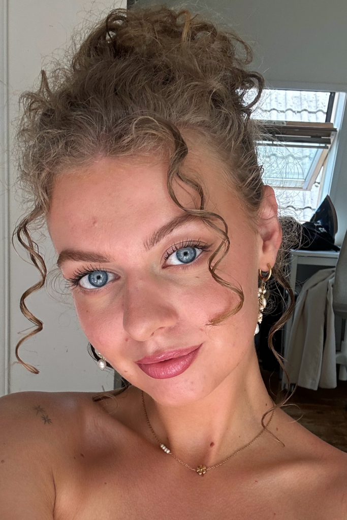 Kiki E.
