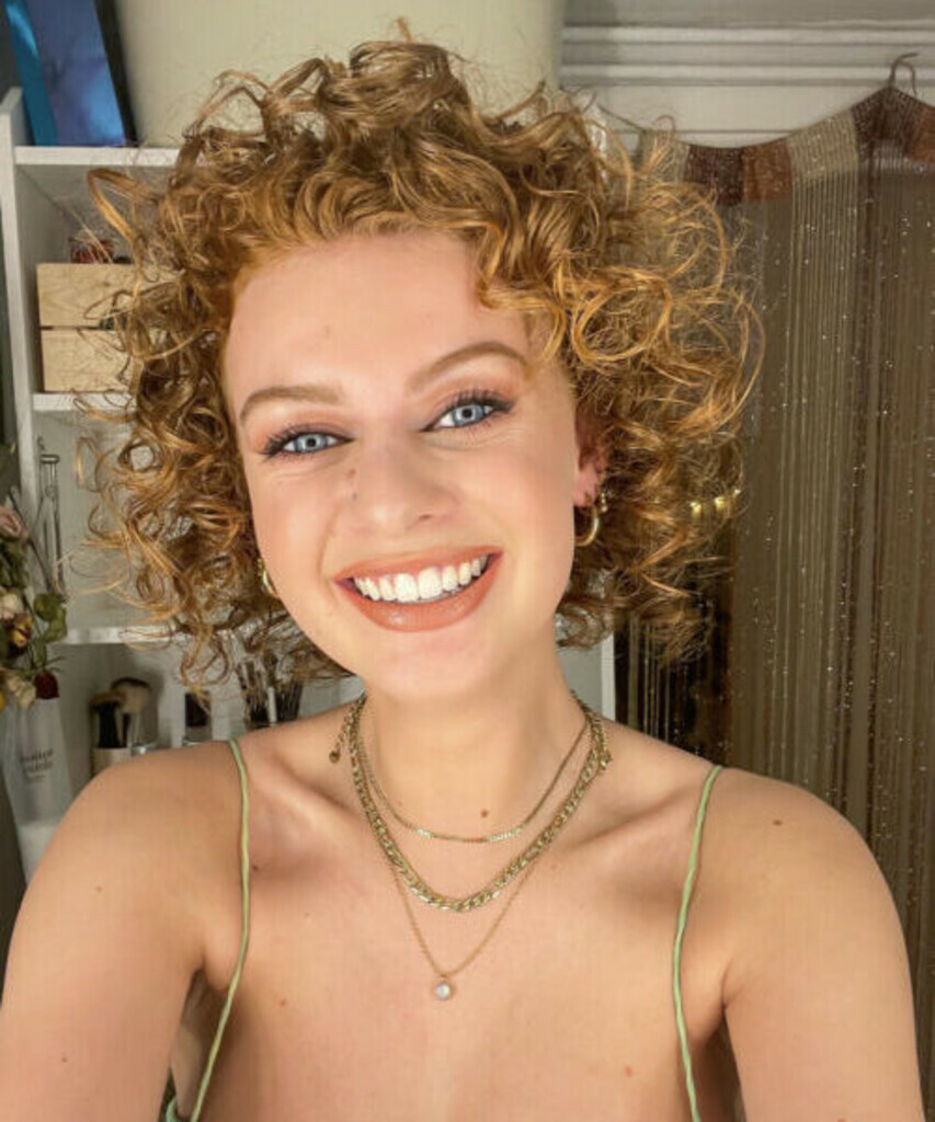 Kiki E.